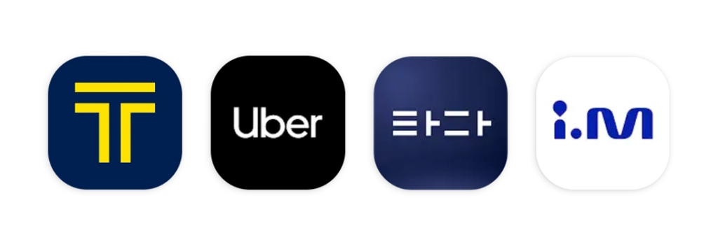 Taxi apps in Korea including Kakao T, Uber, TADA, and i.M app icons on a smartphone screen